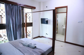 AMP HOME STAY NYALI PRIVATE ROOM WITH POOL
